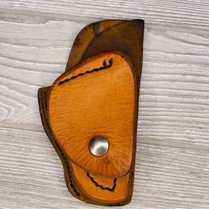 Small leather hand made holster with little button pocket tactical belt gear